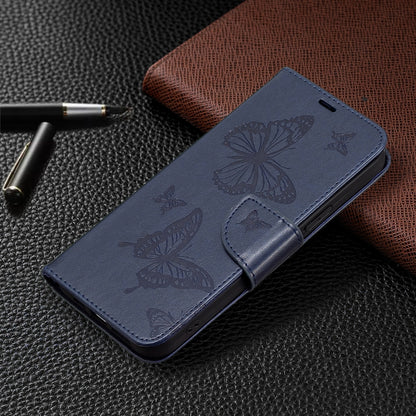 For iPhone 16 Embossing Two Butterflies Pattern Leather Phone Case(Blue) - iPhone 16 Cases by PMC Jewellery | Online Shopping South Africa | PMC Jewellery | Buy Now Pay Later Mobicred