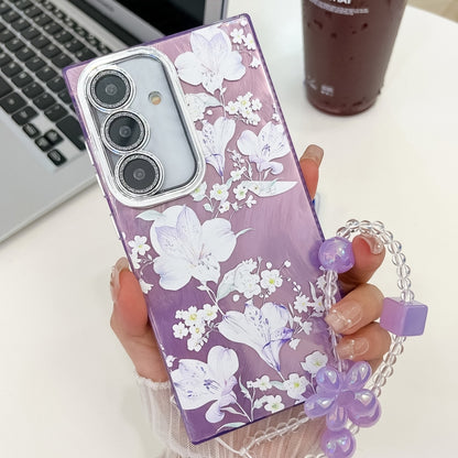 For Samsung Galaxy S25 5G Electroplating Flowers Plants Texture Wristband TPU Phone Case(Pale Purple FlowerFL11) - Galaxy S25 5G Cases by PMC Jewellery | Online Shopping South Africa | PMC Jewellery | Buy Now Pay Later Mobicred